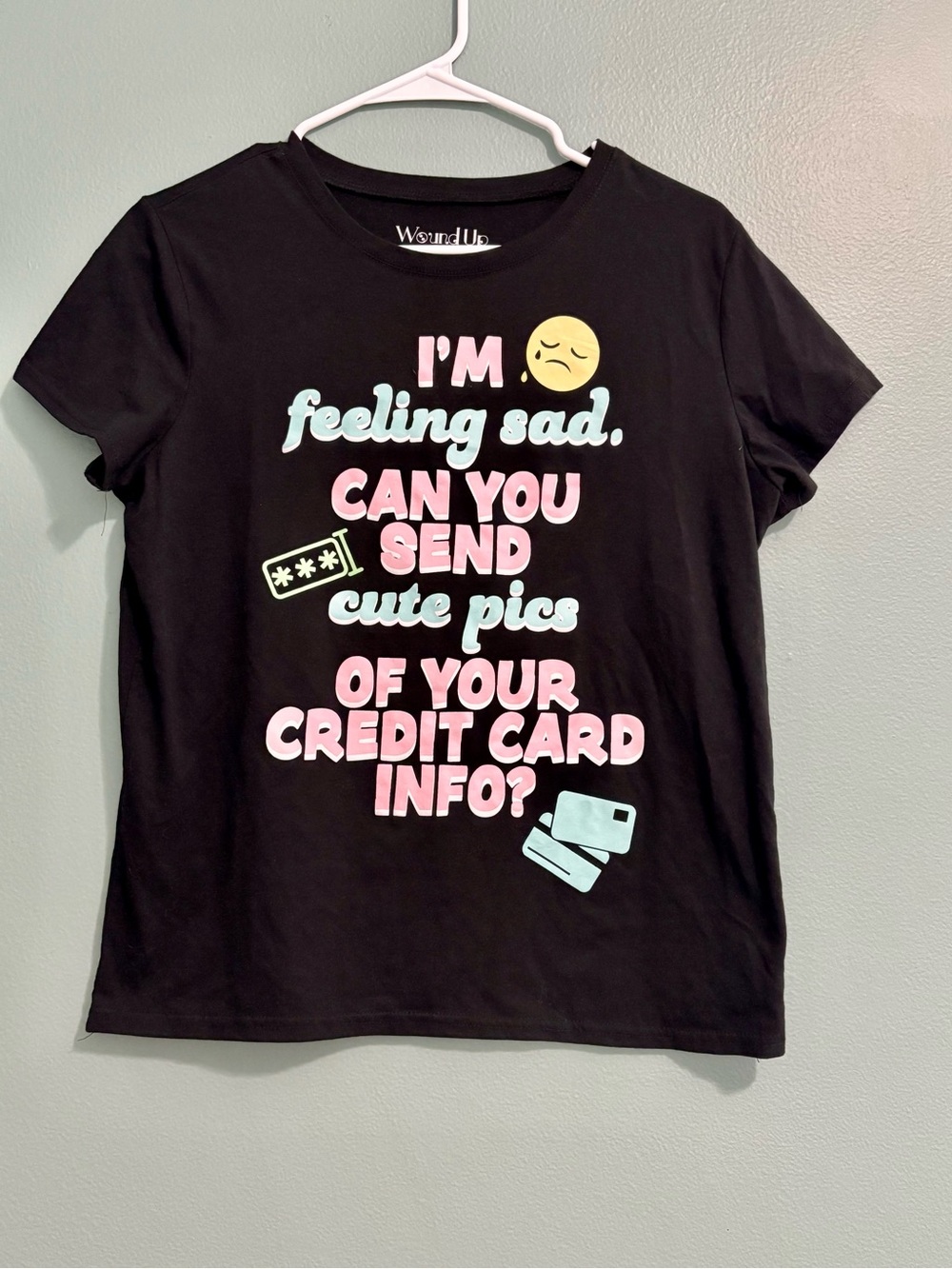 Wound Up Black Tee with Pastel Pink, Mint and Yellow Graphic
